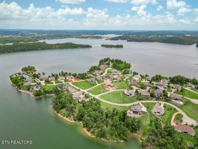 Imagine waking up to the serene beauty of a shimmering lake just on Wind River Golf Course in Tennessee - for sale on GolfHomes.com, golf home, golf lot