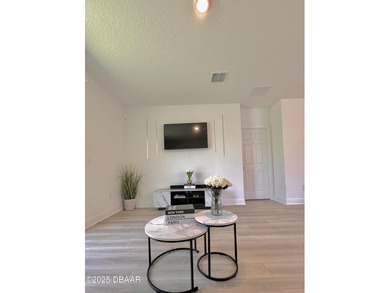 Move-in-ready 4 bedroom, 2 bathroom home with 2,217 sq ft under on LPGA International Golf Course in Florida - for sale on GolfHomes.com, golf home, golf lot