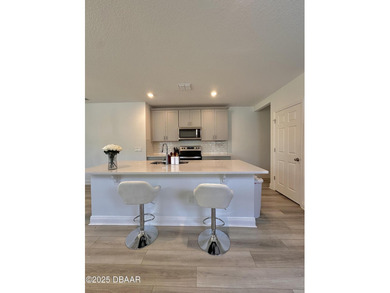 Move-in-ready 4 bedroom, 2 bathroom home with 2,217 sq ft under on LPGA International Golf Course in Florida - for sale on GolfHomes.com, golf home, golf lot