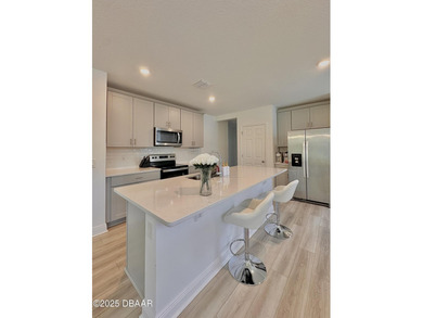 Move-in-ready 4 bedroom, 2 bathroom home with 2,217 sq ft under on LPGA International Golf Course in Florida - for sale on GolfHomes.com, golf home, golf lot