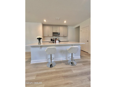 Move-in-ready 4 bedroom, 2 bathroom home with 2,217 sq ft under on LPGA International Golf Course in Florida - for sale on GolfHomes.com, golf home, golf lot