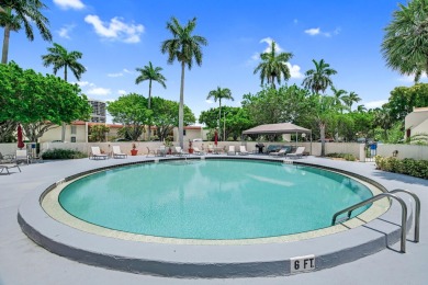 Motivated seller .Beautiful Mediterranean-style 3-story townhome on The President Country Club in Florida - for sale on GolfHomes.com, golf home, golf lot