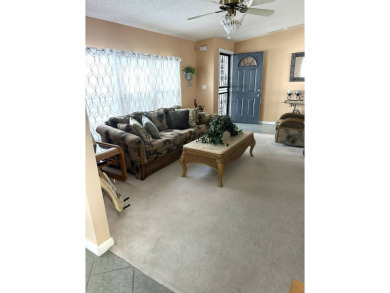 Experience Golf Course Grandeur: Custom-Built 3-Bedroom Palm on Schalamar Creek Golf and Country Club in Florida - for sale on GolfHomes.com, golf home, golf lot