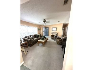 Experience Golf Course Grandeur: Custom-Built 3-Bedroom Palm on Schalamar Creek Golf and Country Club in Florida - for sale on GolfHomes.com, golf home, golf lot
