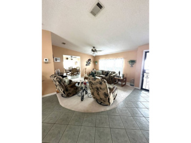 Experience Golf Course Grandeur: Custom-Built 3-Bedroom Palm on Schalamar Creek Golf and Country Club in Florida - for sale on GolfHomes.com, golf home, golf lot