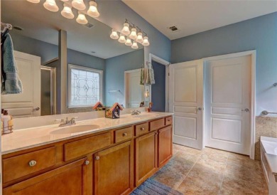 Experience this beautifully updated ranch-style home within an on Canongate Golf At Sun City Peachtree in Georgia - for sale on GolfHomes.com, golf home, golf lot