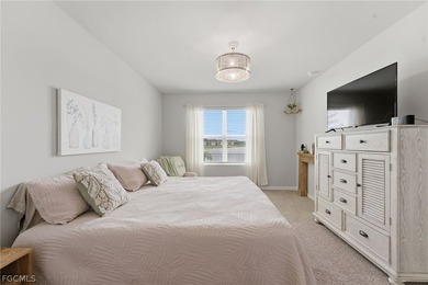 Perfectly positioned to capture tranquil LAKE and FOUNTAIN VIEWS on Herons Glen Golf and Country Club in Florida - for sale on GolfHomes.com, golf home, golf lot