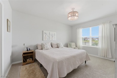 Perfectly positioned to capture tranquil LAKE and FOUNTAIN VIEWS on Herons Glen Golf and Country Club in Florida - for sale on GolfHomes.com, golf home, golf lot