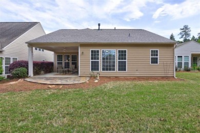 Experience this beautifully updated ranch-style home within an on Canongate Golf At Sun City Peachtree in Georgia - for sale on GolfHomes.com, golf home, golf lot