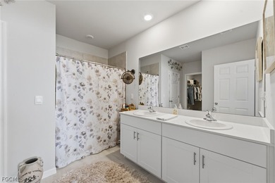 Perfectly positioned to capture tranquil LAKE and FOUNTAIN VIEWS on Herons Glen Golf and Country Club in Florida - for sale on GolfHomes.com, golf home, golf lot