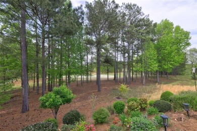 Experience this beautifully updated ranch-style home within an on Canongate Golf At Sun City Peachtree in Georgia - for sale on GolfHomes.com, golf home, golf lot