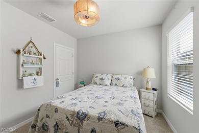 Perfectly positioned to capture tranquil LAKE and FOUNTAIN VIEWS on Herons Glen Golf and Country Club in Florida - for sale on GolfHomes.com, golf home, golf lot