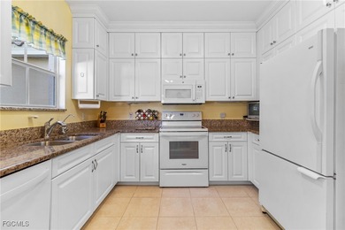 Discover the comfort and ease of turnkey living in this spacious on Spanish Wells Golf and Country Club in Florida - for sale on GolfHomes.com, golf home, golf lot