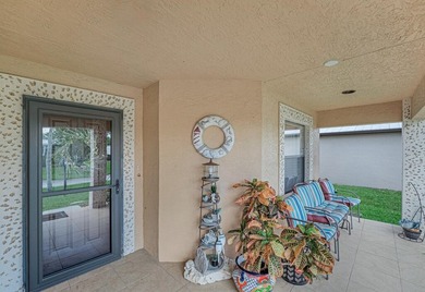 Welcome to this charming home in Spanish Lakes One, one of Port on Spanish Lakes I in Florida - for sale on GolfHomes.com, golf home, golf lot