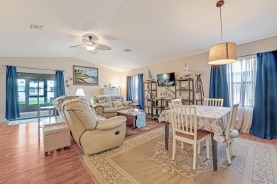 This charming home is located in the highly sought-after Spanish on Spanish Lakes I in Florida - for sale on GolfHomes.com, golf home, golf lot