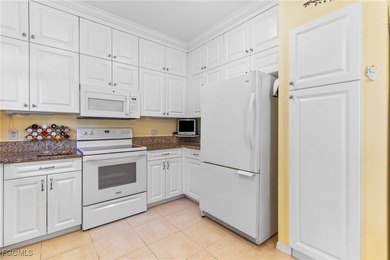 Discover the comfort and ease of turnkey living in this spacious on Spanish Wells Golf and Country Club in Florida - for sale on GolfHomes.com, golf home, golf lot