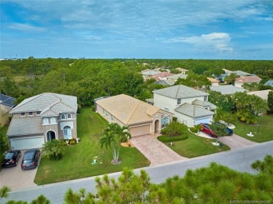 Beautiful Home in Jensen Beach Country Club situated on a on Eagle Marsh Golf Club in Florida - for sale on GolfHomes.com, golf home, golf lot