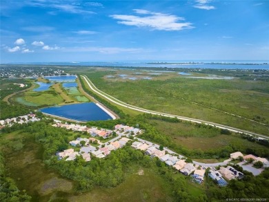 Beautiful Home in Jensen Beach Country Club situated on a on Eagle Marsh Golf Club in Florida - for sale on GolfHomes.com, golf home, golf lot