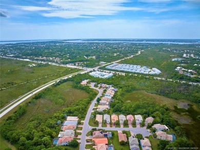 Beautiful Home in Jensen Beach Country Club situated on a on Eagle Marsh Golf Club in Florida - for sale on GolfHomes.com, golf home, golf lot
