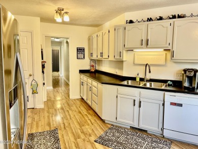 Located just 7 minutes from the world-renowned Pinehurst Resort on Pinehurst Golf Course No. 8 in North Carolina - for sale on GolfHomes.com, golf home, golf lot