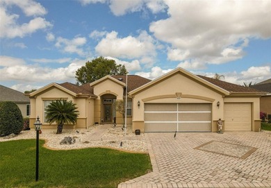 This beautiful Madeira model offers 2 bedrooms, 2 baths plus a on Eagle Ridge At Spruce Creek Country Club in Florida - for sale on GolfHomes.com, golf home, golf lot