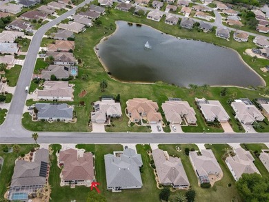 This beautiful Madeira model offers 2 bedrooms, 2 baths plus a on Eagle Ridge At Spruce Creek Country Club in Florida - for sale on GolfHomes.com, golf home, golf lot