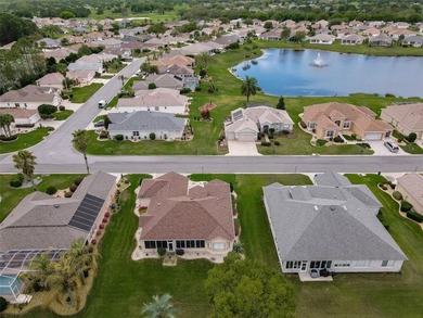 This beautiful Madeira model offers 2 bedrooms, 2 baths plus a on Eagle Ridge At Spruce Creek Country Club in Florida - for sale on GolfHomes.com, golf home, golf lot