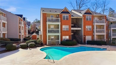 Perched on the top floor and overlooking the sparkling community on North Fulton Golf Course in Georgia - for sale on GolfHomes.com, golf home, golf lot