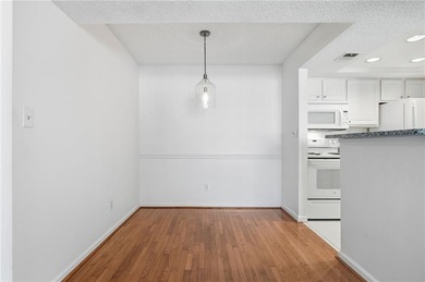 Perched on the top floor and overlooking the sparkling community on North Fulton Golf Course in Georgia - for sale on GolfHomes.com, golf home, golf lot