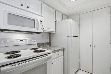 Perched on the top floor and overlooking the sparkling community on North Fulton Golf Course in Georgia - for sale on GolfHomes.com, golf home, golf lot