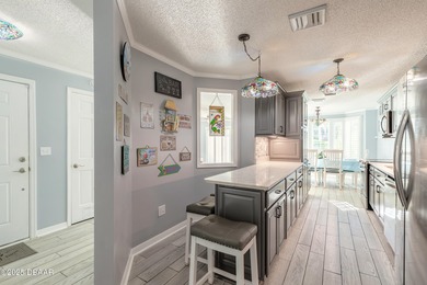 Live every day like it's a beach day in this beautifully on Oceans Golf Club in Florida - for sale on GolfHomes.com, golf home, golf lot