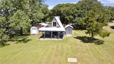 Set on the 7th fairway of the highly sought-after Lake Kiowa on Lake Kiowa Golf Course in Texas - for sale on GolfHomes.com, golf home, golf lot