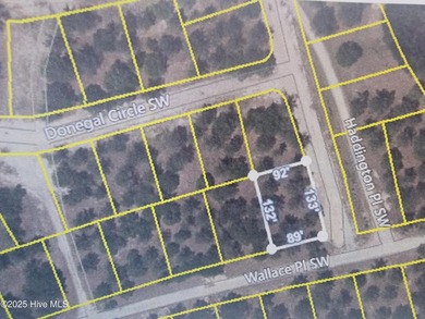 Corner lot in the hottest section of Ocean Ridge Plantation on Sea Trail Golf Resort in North Carolina - for sale on GolfHomes.com, golf home, golf lot