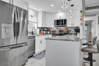 You will fall in love with this COMPLETELY RENOVATED AND on Kings Point Golf -Flanders Way in Florida - for sale on GolfHomes.com, golf home, golf lot