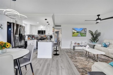 You will fall in love with this COMPLETELY RENOVATED AND on Kings Point Golf -Flanders Way in Florida - for sale on GolfHomes.com, golf home, golf lot