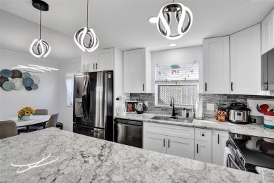 You will fall in love with this COMPLETELY RENOVATED AND on Kings Point Golf -Flanders Way in Florida - for sale on GolfHomes.com, golf home, golf lot