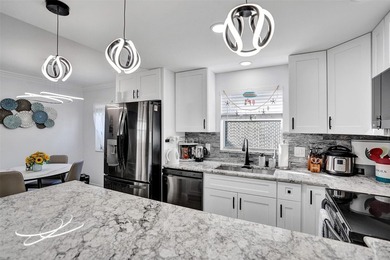 $16,000 Reduction. You will fall in love with this COMPLETELY on Kings Point Golf -Flanders Way in Florida - for sale on GolfHomes.com, golf home, golf lot