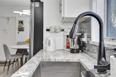 You will fall in love with this COMPLETELY RENOVATED AND on Kings Point Golf -Flanders Way in Florida - for sale on GolfHomes.com, golf home, golf lot