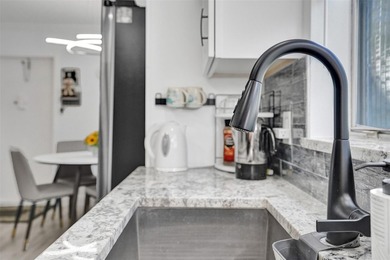 $16,000 Reduction. You will fall in love with this COMPLETELY on Kings Point Golf -Flanders Way in Florida - for sale on GolfHomes.com, golf home, golf lot