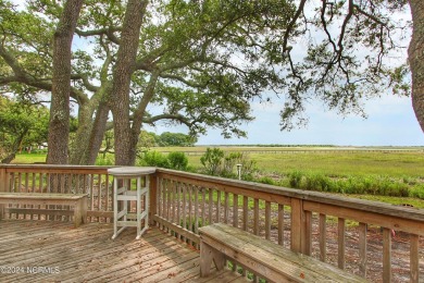 Embark on a journey to this magnificent 3 bedroom 2 bath home on Oyster Bay Golf Links in North Carolina - for sale on GolfHomes.com, golf home, golf lot