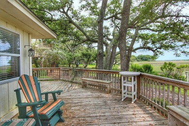 Embark on a journey to this magnificent 3 bedroom 2 bath home on Oyster Bay Golf Links in North Carolina - for sale on GolfHomes.com, golf home, golf lot