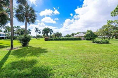 Located on the coveted first floor, convenience is at your on Quail Ridge Golf Course and Country Club in Florida - for sale on GolfHomes.com, golf home, golf lot