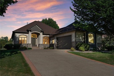 Experience the best of one-level living with peaceful lake views on TPC of the Twin Cities in Minnesota - for sale on GolfHomes.com, golf home, golf lot