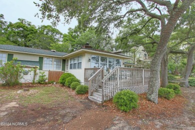 Embark on a journey to this magnificent 3 bedroom 2 bath home on Oyster Bay Golf Links in North Carolina - for sale on GolfHomes.com, golf home, golf lot