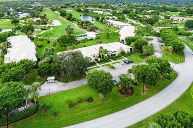 Located on the coveted first floor, convenience is at your on Quail Ridge Golf Course and Country Club in Florida - for sale on GolfHomes.com, golf home, golf lot