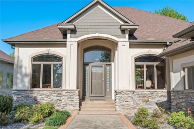 Experience the best of one-level living with peaceful lake views on TPC of the Twin Cities in Minnesota - for sale on GolfHomes.com, golf home, golf lot