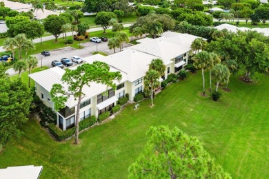 Located on the coveted first floor, convenience is at your on Quail Ridge Golf Course and Country Club in Florida - for sale on GolfHomes.com, golf home, golf lot