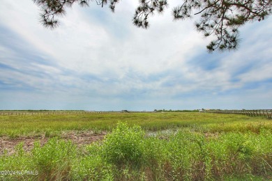 Embark on a journey to this magnificent 3 bedroom 2 bath home on Oyster Bay Golf Links in North Carolina - for sale on GolfHomes.com, golf home, golf lot