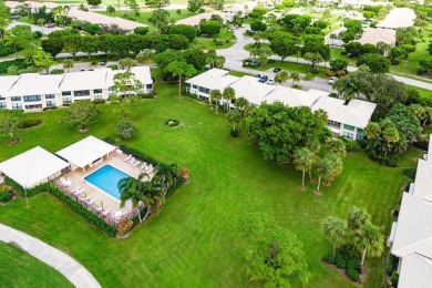 Located on the coveted first floor, convenience is at your on Quail Ridge Golf Course and Country Club in Florida - for sale on GolfHomes.com, golf home, golf lot