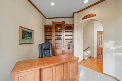 Experience the best of one-level living with peaceful lake views on TPC of the Twin Cities in Minnesota - for sale on GolfHomes.com, golf home, golf lot